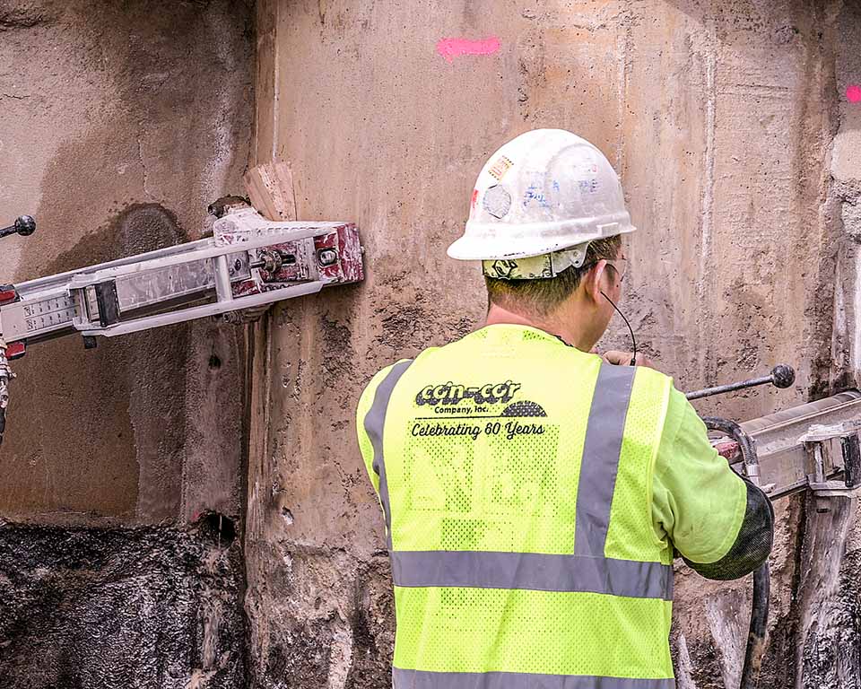 worker cutting concrete